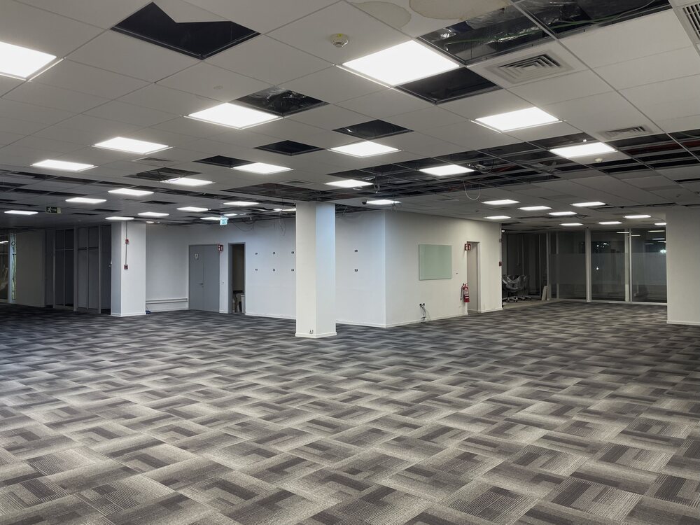 Oficina de Walmart en Huechuraba con alfombra modular